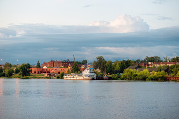 Fototapeta na wymiar Factory district of the city of Kostroma on a summer evening at sunset