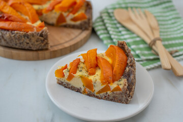 home made pumpkin quiche lorraine on a table