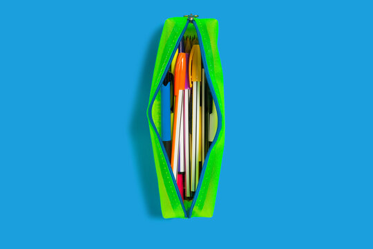 Yellow Pencil Case On A Blue Surface