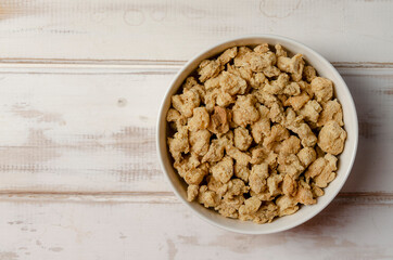Dry vegan meat. Soy meat on wooden