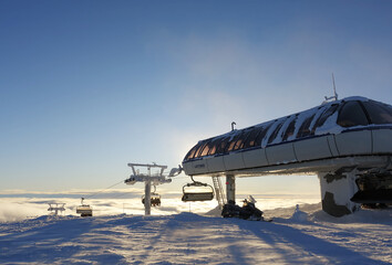 Top station of a ski lift in wintertime in arctic Norway in the early sunrise