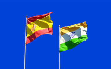 Flags of Spain and India.
