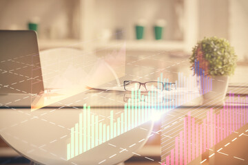 Double exposure of financial graph drawing and office interior background. Concept of stock market.
