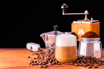 Fresh cafe for refresh caffeine white cup roasted organic coffee bean farm in vintage wood grinder classic metal coffee pot for black espresso and glass cream foam milk cappuccino latte