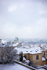 snow in winter prague view of saint nicholas church mala strana old town