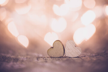 Two hearts on bokeh background