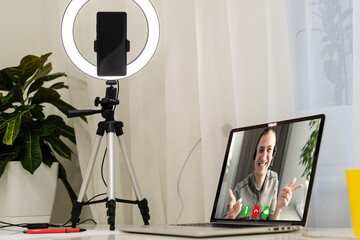 Fototapeta na wymiar laptop with videoconference stands on the table
