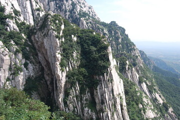 Majestic view from the mountain peak at the moment of freedom and meditation