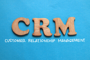 CRM Customer Relationship Management, text words typography written on blue background, life and...