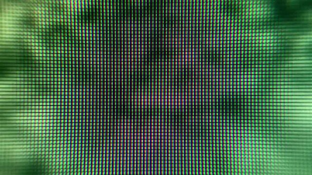 LCD screen pixels. Macro Shot Of Computer Screen, Pixels Texture. Abstract Blue Background. Close up LED Display With Color Shades technology. Closeup Monitor.