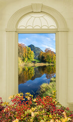 view through arched door, moor lake in autumn, allgau alps