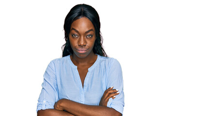 Young african american woman wearing casual clothes skeptic and nervous, disapproving expression on...