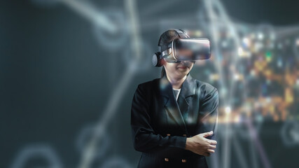 Business female wearing makes gestures with augmented reality headset, Shows digital meeting management head up display HUD.