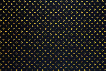 Elegant and rich abstract textile background. Gold monograms on the dark background. The royal robe.
