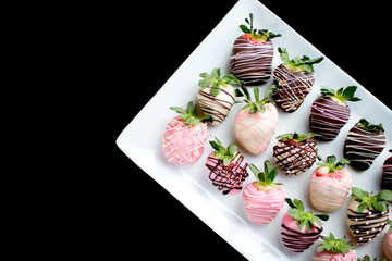Colorful Strawberry Covered Chocolate on Black Background