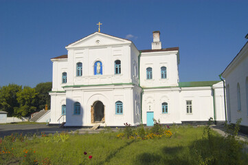 Nikolaevsky (Mykolayivsky) monastery against blue sky