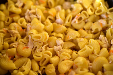 Pasta with meat in the navy with seasonings