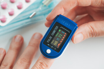 Pulse Oximeter finger digital device to measure oxygen saturation in blood.