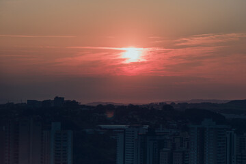 Dawn with clouds and reddish sky concept image