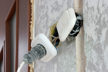 danger light switch and connection of the cable to an electrical socket.