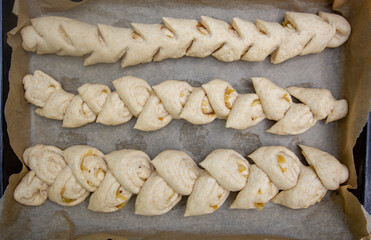 homemade bread with apples and nuts in the shape of an ear