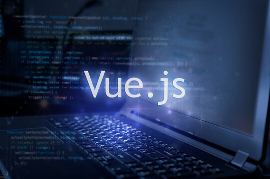 Vue.js inscription against laptop and code background. Learn vue programming language, computer courses, training.
