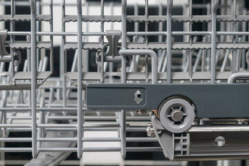 pull-out mechanism of the dishwasher basket, close-up view