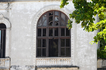 Fototapeta na wymiar destroyed wooden window of abandoned property