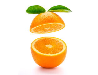 Fresh orange cut in half on white background