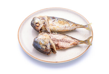 Delicious fried mackerel in a plate on a white background - top view