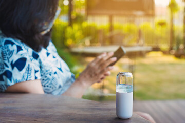 Alcohol nano mist sprayer for hand cleaning to prevent the spread of Corona virus (Covid-19) placed...