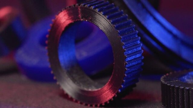 Replacement parts for machine tools in factories, printered on 5D 3D printers. Parts for faFused deposition modeling, 3D printer printing an object from plastic.