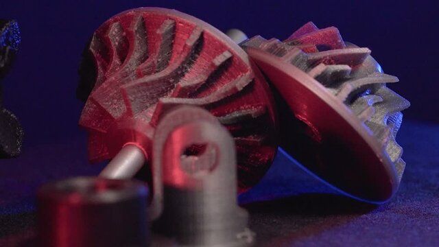 Replacement parts for machine tools in factories, printered on 5D 3D printers. Parts for faFused deposition modeling, 3D printer printing an object from plastic.