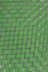 beautiful macro photo of an abstract metal kitchen strainer background