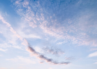 Magic clouds scape in the bright blue sky background