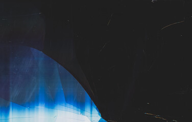 Damaged screen background. Blur distortion. Dark shattered faded laptop screen with smeared dirt...