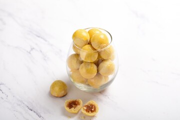 Nastar or indonesian pineapple tart cookies in glass jar.very popular for serving to celebrate Eid al fitr