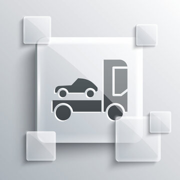 Grey Car transporter truck for transportation of car icon isolated on grey background. Square glass panels. Vector Illustration.