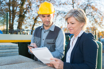 construction material supplier clerk checking the delivery