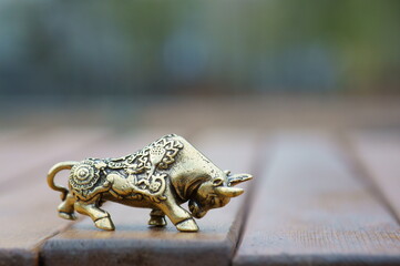 Metal bull figurine close-up. The Feng Shui symbol.