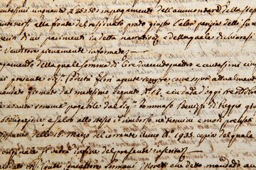 Ancient manuscript of 1700 century written in ink and goose pen in Italian. Antique letter with handwritten text. Stained texture background. Vintage style toned picture  © DVisions