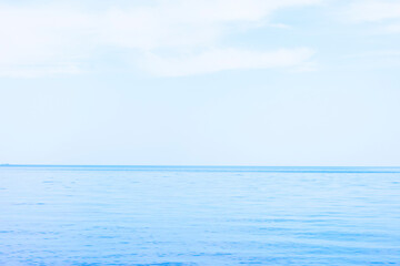 Layout made of seascape with blue water of sea or ocean and sky with little waves. Copy space, blank