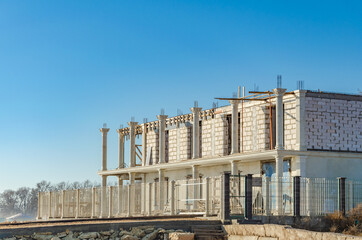 Fototapeta premium Construction of a stone two-story house.