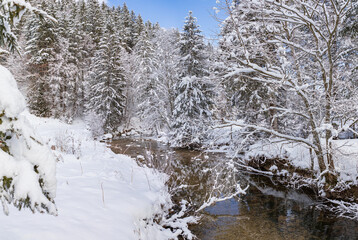 wintry river in the alps