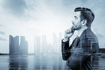 Young handsome businessman in suit with hand on chin thinking how to succeed, new career opportunities, MBA. Singapore on background. Double exposure.