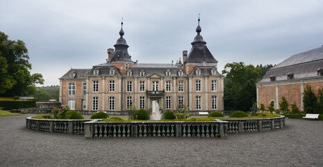 Modave Castle, Belgium. View of fountain and main facade.