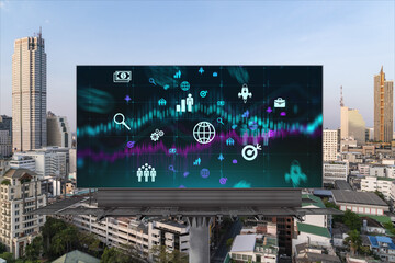 Research and development hologram on billboard over panorama city view of Bangkok. The hub of new technologies to optimize business in Southeast Asia. Concept of exceeding opportunities.