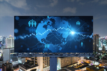 World planet Earth map hologram and social media icons on billboard over night panoramic city view...