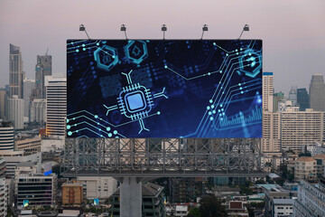 Glowing hologram of technological process on billboard, aerial panoramic cityscape of Bangkok at sunset. The largest innovative hub of tech services in Southeast Asia.