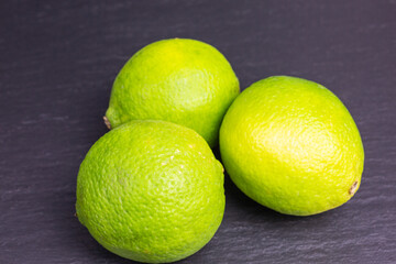 group of fresh green lime fruits - 409677694